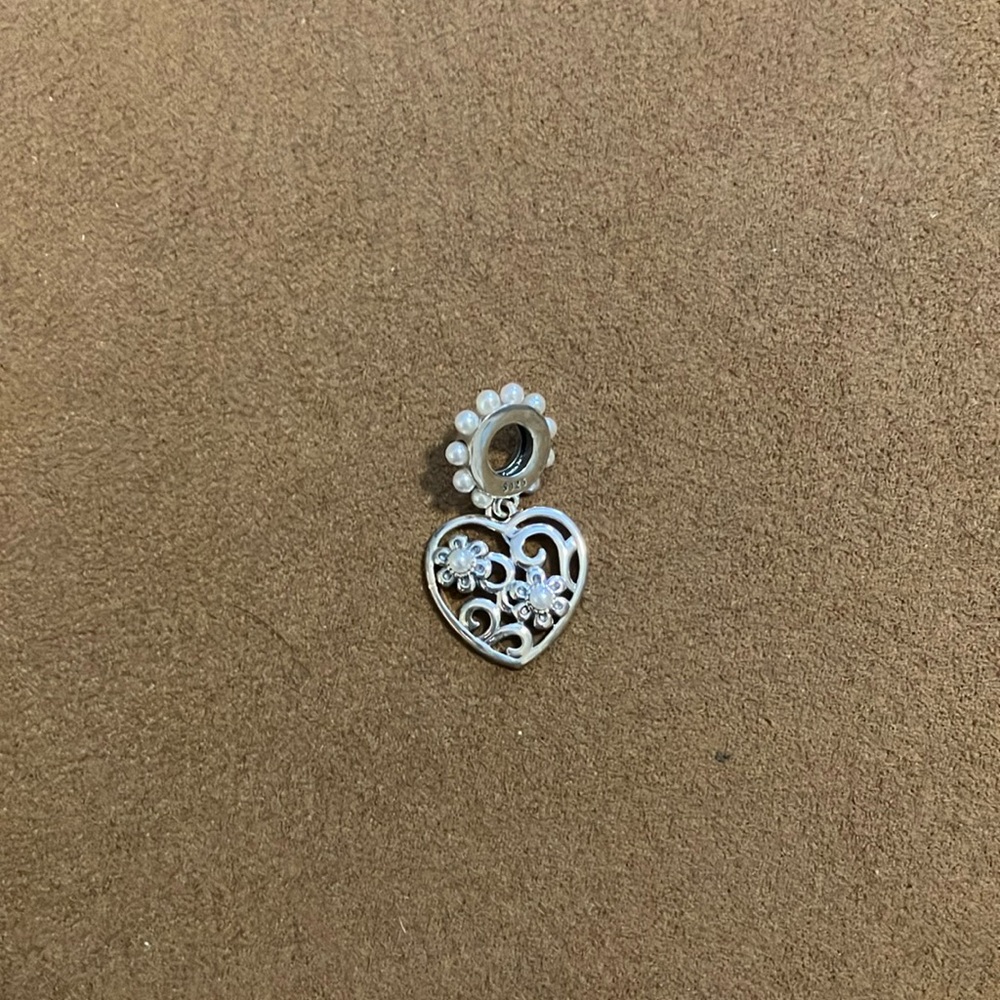 Heart charm.